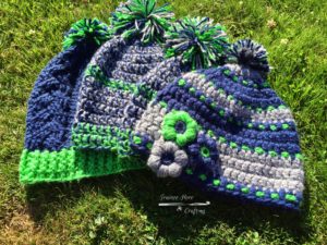 Four Seahawks crochet hats. 