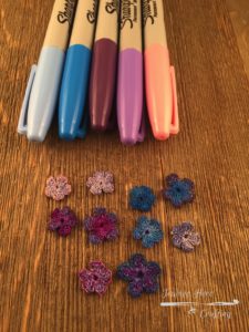 Sharpies and colored crochet flowers