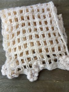 Lacy trellis scarf. Free Crochet Pattern at traineehero.com.