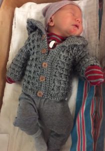 Baby Jim in his Waffle Stitch Cardigan Baby Sweater