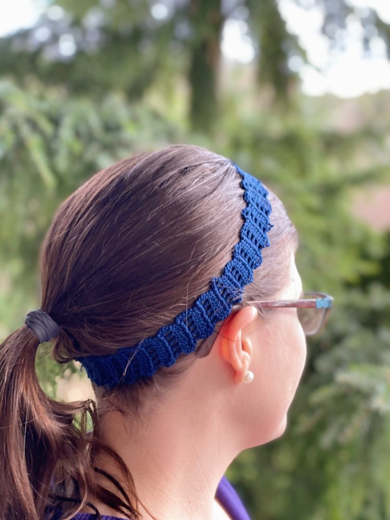 Me wearing my navy blue crochet headband made from crochet edging pattern.