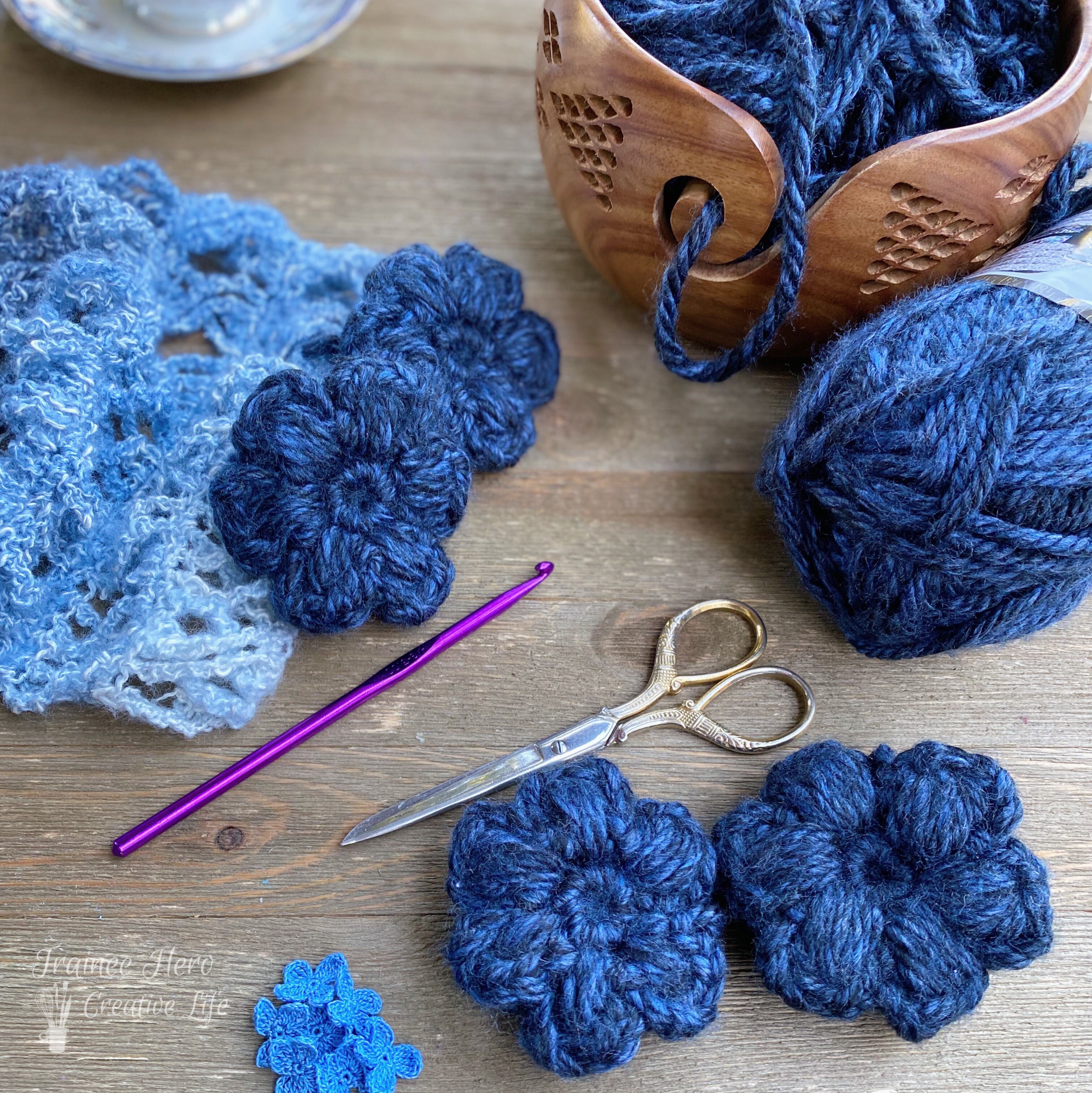 Crochet puff stitch flowers and the start of the convertible crochet scarf.